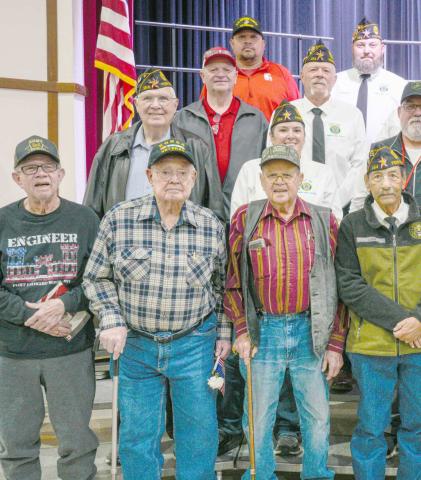 Area veterans were honored at Perryton High School’s annual Veterans Day program on Nov. 12. Pictured are, from left, front row, Don Simpson, Robert Mantooth, Neal Davis, Charlie Ludi, Byerl Bates, Don Hulsey, and Robert Overton; second row, Dempsey Malaney, Nikki Green, Dunningan McWhorter, Dr. H.R. Sharp, and Raymond Holt; third row, Mike Richardson, J.W. Hardy, J.W. Brown, Arvel Wall, Doug McGarraugh, and Gerardo Rosales; and back row, Frank Pacheco, Chase Allison, Danny Thurman, Nathan Ellzey, and Ryan 