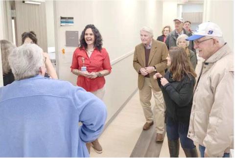 TOURING THE FACILITY—Staff members at the new Perryton Health Center, housed in the L. Kirk Courson Building, adjacent to Ochiltree General Hospital, conducted building tours during the grand opening and open house at the health center. The facility has 32 exam rooms on 14,626 square feet, with space for nine potential health care providers.