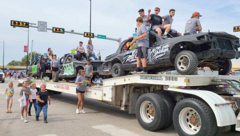 DEMOLITION DERBY PARADE WINNER— Main Street was lined with thousands of people on Aug. 20 who turned out to enjoy the annual Wheatheart of the Nation Celebration parade. The top prize in the parade’s Demolition Derby Cars category went to the IOU team.