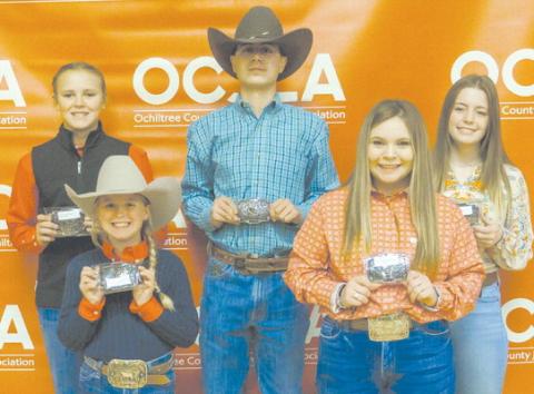 The Reserve Grand Champion winners were presented with their Buckle Awards at this year’s Ochiltree County Junior Livestock Show and Sale on Jan. 20-21. Pictured are, from left, front row: Lakyn Boxwell (Reserve Grand Champion Steer) and Avery Swenhaugen (Reserve Grand Champion Swine); back row: Payton Schilling (Reserve Grand Champion Goat), Treven McKinley (Reserve Grand Champion Heifer), and Averi Pshigoda (Reserve Grand Champion Lamb). (Photo Credit: Brittany Morgan)
