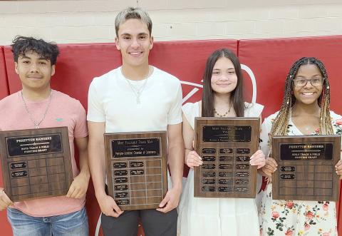 PHS TRACK STARS BRING HOME AWARDS— Perryton High School’s track team was honored at the Perryton High School All Sports Awards Banquet. Pictured are, from left: Noel Venegas, boys Fighting Heart winner; Julian Cervantes, boys MVP; Sabrina Nyman, girls MVP; and Tiana Hill, girls Fighting Heart winner.