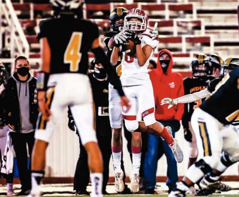 NICE CATCH Isaac Castro (#8 junior) intercepts the Seminole QB and secured another turnover for the Ranger defense against the Seminole Indians Friday during Homecoming festivities at Ranger Field. The Rangers took th e contest, 28-14. See story for more information. (Photo by David Erickson)