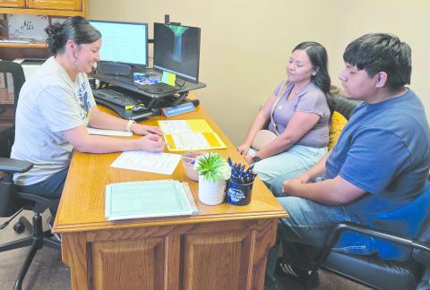 Frank Phillips College, Allen Campus held an open house on Monday evening. Visitors met campus staff, toured the campus, met with advisors, and got help with applications for admission and financial aid forms. Pictured reviewing some campus documents are, from left, academic coordinator Monica Hernandez, Bianna Ontiveros, and Aiden Ontiveros.