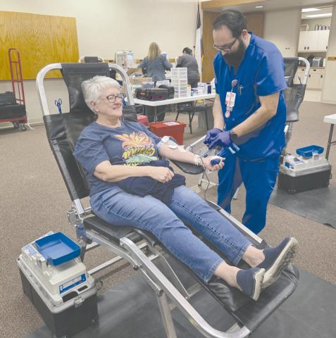 Coffee Memorial Blood Center in Amarillo held a blood drive on Tuesday afternoon at Frank Phillips College, Allen Campus, as they sought to increase the number of blood donors in the area and the amount of blood donated for the entire region. Pictured are, from left, Joan Quist and Coffee Blood Center phlebotomist Joseph Shipp. Quist said her blood type is O negative, one of the most sought-after blood types, so she tries to donate whenever she can.