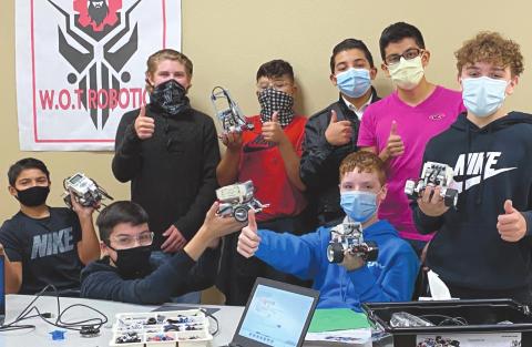 TECHNO WIZARDS Members of Perryton Junior High’s W.O.T Robotics team recently received a number of donations, including $5,000 from Phillips 66. Pictured from left, front row, are Caden Rodriguez, Elijah Garcia, and Trenton Estes; and back row, Gus Eylar, Rogelio Munoz, Saul Palma, Emmanuel Soto, and Sam DeSantiago.