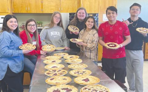 YOUNG BAKERS—Students from Perryton High School’s Culinary Arts program show off some of the many pies they baked and entered into the annual Rotary Pie Contest, which was held on Saturday, Feb. 19. Pictured are, from left, Jackie Juarez, Emmali Mariscal, Jessica Painter, Rylee Williams, Alyssa Rosales, Jonathan Espino, and Adriel Molinar.