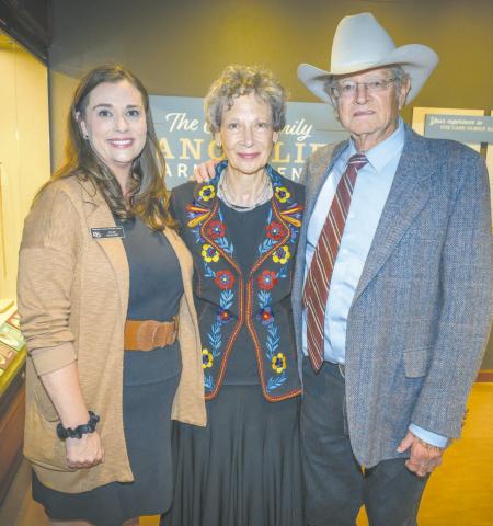 NRHC director of education Julie Hodges, left, with Kris and John Erickson