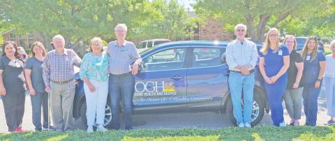 HOSPICE VOLUNTEERS ACQUIRE CAR FOR OGH STAFF