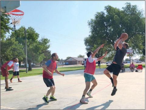 Local basketball players got together on Saturday morning, Aug. 3, for some friendly competition in a 3v3 basketball tournament at Whigham Park. The tournament benefitted the Ludi Pena Martin Foundation and attracted players and fans from all over the city.