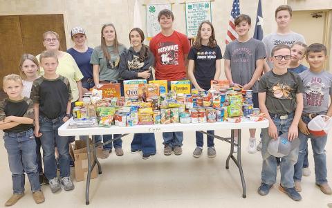 4-H FOOD DRIVE NETS OVER 200 ITEMS— Members of Ochiltree County 4-H held a scavenger hunt food drive last Thursday evening as teams of students roamed Perryton collecting food to donate to Jireh Food Ministry. Members collected 203 food items to donate to Jireh.