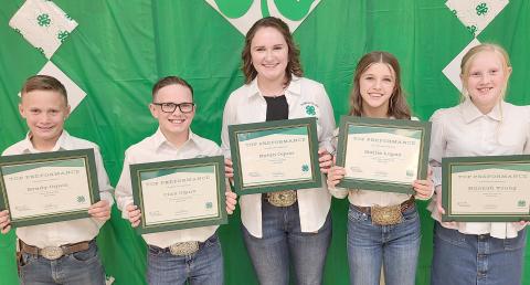 HIGH POINT WINNERS— Ochiltree County 4-H held their annual awards ceremony Monday night at the Ochiltree County Expo Center. The High Point Award winners were, from left, Brady Oquin, Clay Oquin, Rylan Oquin, Hallie Lopez, and Hannah Young. Not pictured is Nathan Knox.