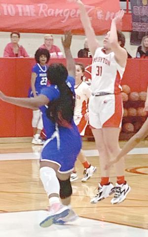 RANGERETTE ACTION—Junior Mackenzi Stokes shoots a contested 15 foot jump shot over a Lady Don, in the Rangerettes’ contest against Palo Duro Friday. The Rettes came up just short in the 41-38 contest.
