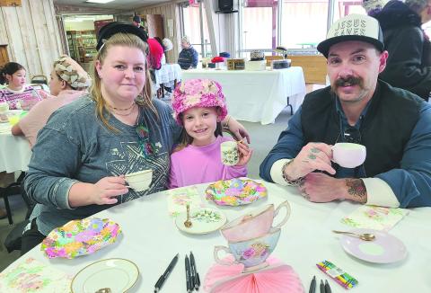 Parents, kids, and grandparents of all ages stopped by the Museum of the Plains on Sunday, Jan. 19, to enjoy an old-fashioned afternoon tea party. Party-goers picked out fancy hats to wear and enjoyed tea, punch, finger sandwiches, cookies, and plenty of good company, as well as checking out the museum’s new display of Doris Wilkens’ children’s tea set collection. Pictured are, from left, Carolyn Thomas, Juliza Thomas, age 6, and Jordan Thomas.