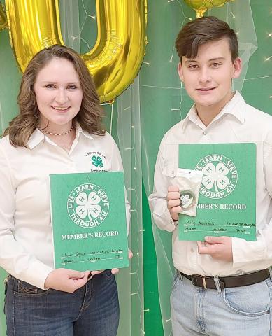 RECORD BOOKAWARDS— Ochiltree County 4-H’s annual awards ceremony was held Oct. 9 at the Expo Center. Awards were presented for record books by 4-H members. The award is given to every 4-H member who completes a record book of their experiences in 4-H. Members who completed record books included, from left, Rylan Oquin and Kile Merrick.