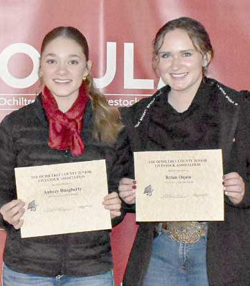 Two students were awarded scholarships during the Ochiltree County Junior Livestock Show and Sale on Jan. 17-18. Pictured are, from left, Aubrey Daugherty and Rylan Oquin. ( Photo credit: Morgan Dudley)