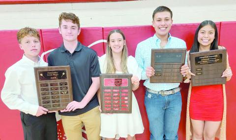 Perryton High School’s tennis teams were honored on May 6 at the Perryton High School All Sports Awards Banquet. Pictured are, from left, Preston Hernandez and Conner Kitchens, who shared the Outstanding Boys Tennis Player award; Olivia Eisenman, winner of the girls’ Outstanding Tennis Player award; Carlos Hernandez, who took home the boys’ Fighting Heart award; and Mariel Martinez, the recipient of the girls’ Fighting Heart award.