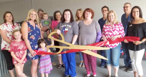 CHAMBER MEMBERS HOLD RIBBON CUTTING