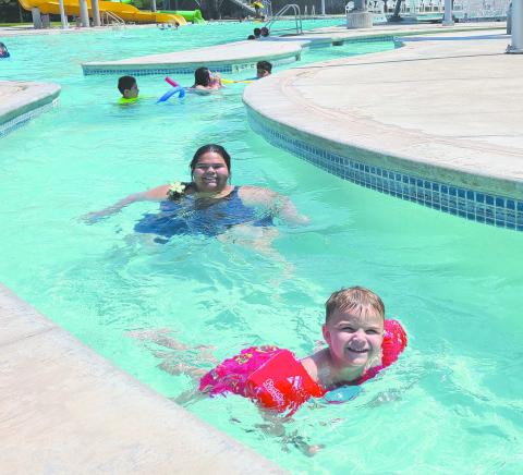 The Perryton Municipal Water Park has opened once again for the summer swimming season. The regular hours for the water park are Monday through Saturday from 1-7 p.m. On Sundays, the pool is open from 2-6 p.m. In addition to the pool, slides, diving area, and splash pad, many swimmers enjoy floating leisurely around the Lazy River.