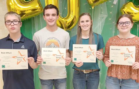 Th e annual awards ceremony for Ochiltree County 4-H was held Oct. 9 at the Expo Center. Winners of the Best Effort Awards included, from left, Nathan Knox, Tanner Barnes, Tatum Oquin, and Karson Pribble. Not pictured is Canon Huddleston.