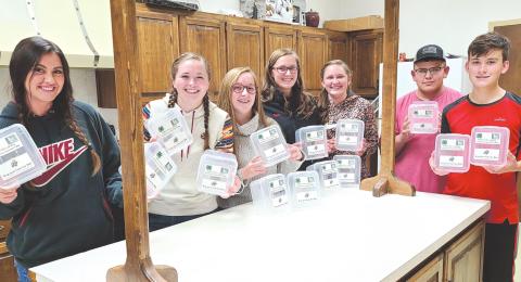 4-H PREPARING DONATION BOXES FOR SNACK PAK