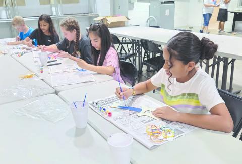 Frank Phillips College, Allen Campus, hosted the first session of their annual Kids College last week, with fun classes for kids 5-12 focusing on Hawaii. Kids enjoyed classes about arts and crafts, ocean life, science, music, painting, and more. Pictured are the kids in the 9-12 age group’s arts and crafts class decorating ukuleles.