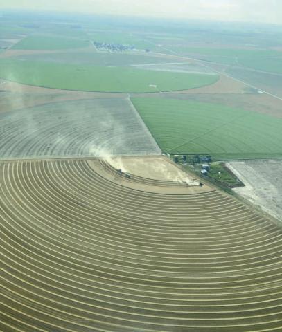 BIRD’S EYE VIEW OF HARVEST— This is an aerial view of harvest in action southwest of Farnsworth in early July, courtesy of Doug Hale.