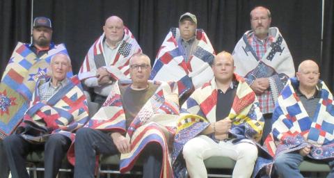 QUILTS OF VALOR PRESENTATIONS— The Friendship Quilt Guild presented 16 Quilts of Honor on Oct. 20. The quilts were given in two groups. The first group included, first row, from left, Charles Kelly, Dave Patterson, Tyler Harper and Mike Richardson; and second row, J.W. Brown, Matthew Harper, Stacy Brown and Ron Bishop. Not pictured is Stephen Montgomery “Monty” Joiner.