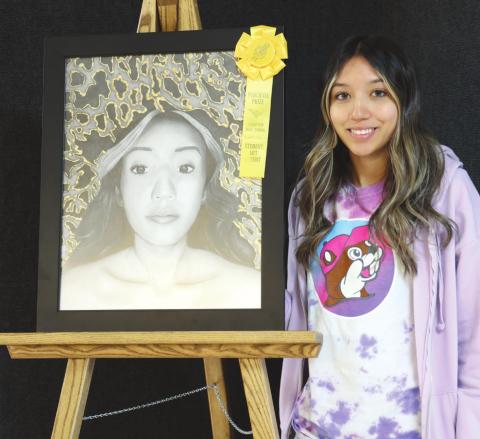 ENRIQUEZ WINS BEST OF SHOW Perryton High School’s annual art show will run from May 2-10 during school hours at the high school. Visitors can also see the displayed art after school hours on May 2 and on May 9. The Best in Show and purchase prize award went to Denisse Enriquez for “Heart of Gold,” a pencil drawing with gold foil. Enriquez also received a $150 cash prize for her winning artwork.