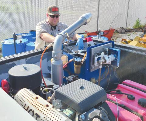 BATTLING THE BLOODY BUGS With summer in full swing and mosquitoes making their return to the area, the City of Perryton is busy taking care of several methods to reduce the numbers of adult mosquitoes and their larva, including spraying pesticide during the week, placing nontoxic pellets in areas of standing water, and working to eliminate standing water wherever possible. Pictured above is Thomas Beal, a spray tech with the city, refilling the anti-mosquito pesticide in one of the city’s sprayers.