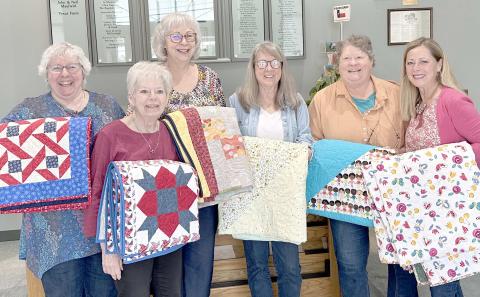 The Texas Panhandle Quilters Guild delivered homemade quilts to Perryton families affected by the tornado that struck the city on June 15. The original goal for the project was to make and deliver 25 quilts, but that number grew to 48 as more members of the guild wanted to participate. Pictured are some of the Amarillo area members who delivered quilts in early October, including, from left, Lucille Dudley, Pat Drake, Kathy Jones, Susan Kraft, Nancy Owen, and guild president Sherrie Elliott.