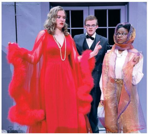 Perryton High School’s Theatre Department performed in UIL One-Act Play District competition on Tuesday here in Perryton, qualifying as Alternate. Perryton’s play was “Suite Surrender” by Michael McKeever. The farce is set at a luxury hotel in the 1940s as two Hollywood divas are accidentally booked into the same suite. Pictured are, from left, Braylee Brown as Athena Sinclair, Zavier Kinney as hotel manager Bernard S. Dunlap, and Tiana Hill as Claudia McFadden.