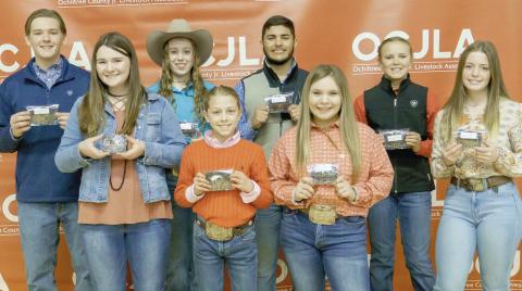GRAND SHOWMANSHIP WINNERS— At the Ochiltree County Junior Livestock Show and Sale on Jan. 2021, the Grand Showmanship Awards were presented to participating students. Pictured are, from left, front row, Emilee Butler, Victoria Wright, Avery Swenhaugen, and Averi Pshigoda; and back row Cash Wheeler, Maddie Schickedanz, Dalton L’Esperance, and Payton Schilling. (Photo credit: Brittany Morgan)