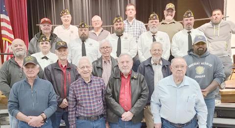 Area veterans were honored at Perryton High School’s annual Veterans Day program. Pictured are, from left, front row, are Doug McGarraugh, Senn Slemmons, Byerl Bates, and Robert Mantooth; second row, Ken Schwalk, Nikki Green, Duane McGarraugh, Bob Hulsey, Arvel Wall, and David Rogers; and third row, Mike Richardson, J.W. Brown, Chase Allison, J.W. Hardy, and Mike Skinner.