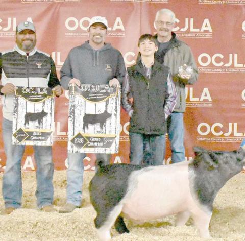 At the Ochiltree County Junior Livestock Show and Sale on Jan. 17-18, Conner Pribble took home the award for Grand Champion Swine. His animal was purchased by Western Equipment, 21 Farms, Joyce Smith, Farnsworth Seed, and Pribble Farms. Pictured are, from left, Ramon Vela, Jason Lilly, Connor Pribble, and David Peckenpaugh. ( Photo Credit: Morgan Dudley)