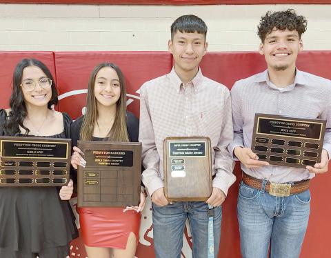 Perryton High School’s cross country teams were honored at the Perryton High School All Sports Awards Banquet. Pictured are, from left: girls MVP Averie Russell; girls Fighting Heart award winner Natalie Mandujano; boys Fighting Heart winner Damian Chavez; and boys MVP Juan Acevedo.