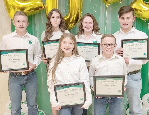 HIGH POINT WINNERS— Ochiltree County 4-H held itsannual awards ceremony Oct. 9 at the Ochiltree County Expo Center. The High Point Award winners were, from left, front row, Hallie Lopez and Clay Oquin; and back row, Kyle Oquin, Brooke Helker, Rylan Oquin, and Kile Merrick.