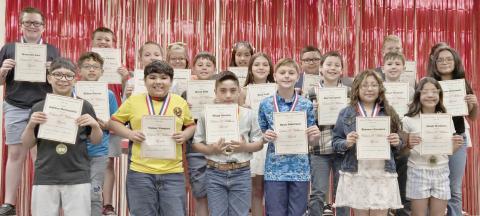 Fourth grade students receiving the Edwin F. Williams Award as the top students in the class were first row, Adrian Hernandez, Victor Vazquez, Diego Rosales, Ryan Roberson, Brianna Ramirez, and Aleah Martinez; second row, Ethan Garcia, Jeffery Hinshaw, Reece Kile, Zoey Leal, Darrell Lynch, Chase Manross, and Aleysa Ontiveros; and third row, Maverick Kerl, Kane Alvarez, Marlee Barnett, Daniella Becerril Hernandez, Ayden Cruz, Jax Cunningham, and Melanie Flores.