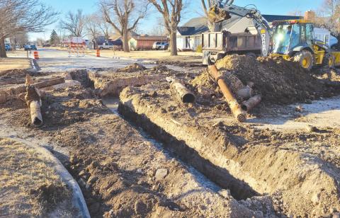 WATER LINE REPAIRS IN PROGRESS AT COLGATE AND 11TH