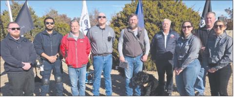 The Wreaths Across America ceremony on Saturday, Dec. 13, featured special recognition for Ochiltree County’s first responders. Pictured are, from left: Mike Hicks, Angel Ornelas, Jason Vanosdol, Thomas Beal, Jeff Mincy, Perryton Fire Chief Paul Dutcher, Olivia Thompson, Ochiltree County Chief Deputy Wayne Floyd, and Amanda Cowan.
