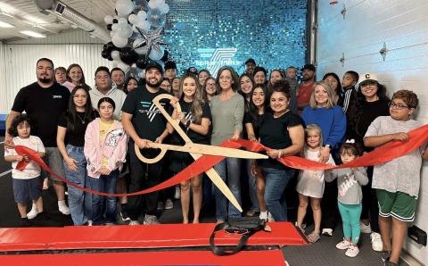 TOP RUSH ATHLETICS RIBBON CUTTING – Members of the Perryton-Ochiltree Chamber of Commerce, along with friends, family, staff, and well-wishers were on hand recently for a ribbon-cutting ceremony for Top Rush Athletics at 820 S. Industrial in Perryton. The gymnastics and cheerleading gym is owned by Anahi and Junior Amparan.