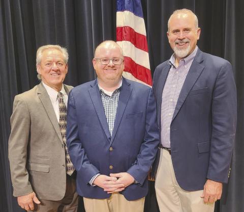 Perryton High School’s annual Veterans Day program brought together veterans from recent campaigns in the Middle East all the way back to World War II. In addition to presentations recognizing every veteran attendee, there were also musical performances and a special presentation by guest speaker Ben Malone. Pictured are, from left, emcee Marlon Sparks, Malone, and PISD Superintendent Greg Brown.