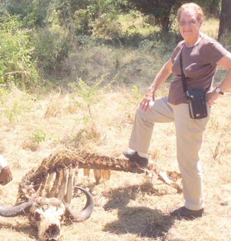 Cavita Kile with African buffalo skull