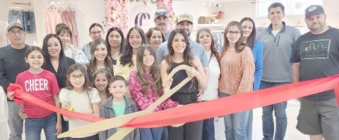 RIBBON-CUTTING HELD AT CC &amp; CO— Members of the Perryton-Ochiltree Chamber of Commerce, along with friends, family, staff, and well-wishers were on hand for a ribbon-cutting ceremony for the grand opening of CC &amp; CO Boutique at 1502 S. Main in Perryton. The clothing boutique is owned by Clarissa Cepeda and Alex Cepeda.