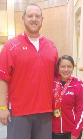 Coach Casey Arruda with world champion powerlifter Janet Becerril
