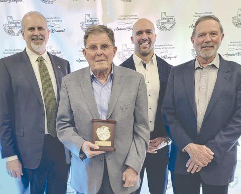 BOXWELL NAMED CITIZEN OF THE YEAR Dick Boxwell received congratulations from many well-wishers after he was named the Citizen of the Year on Feb. 20 during the Perryton-Ochiltree Chamber of Commerce’s annual banquet. Pictured are, from left, banquet emcee Greg Brown, Boxwell, Caleb Campbell, who provided the evening’s entertainment, and presenter Brady Yeary.