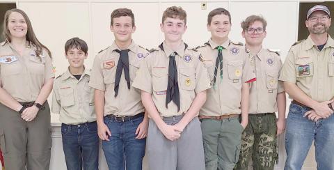 SCOUTS EARN MERIT BADGES
