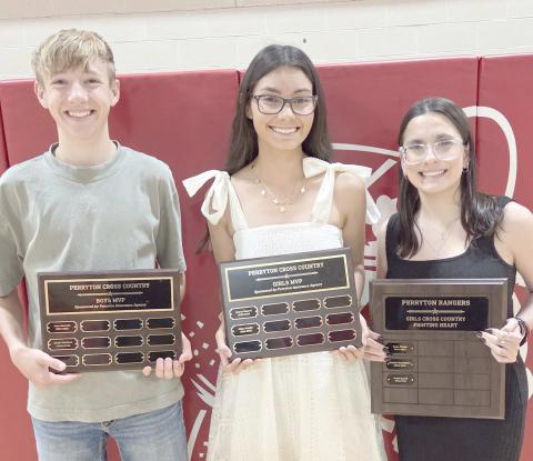 Perryton High School’s cross country teams were honored at the Perryton High School All Sports Awards Banquet. Pictured are, from left: boys MVP Jacob Erickson; girls MVP Alexa Rosales; and girls Fighting Heart award winner Averie Russell. Not pictured is boys Fighting Heart award winner Angel Ramirez.