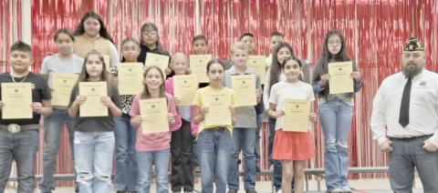 Fifth graders at Williams Intermediate School receiving American Legion outstanding citizenship awards were, first row, from left, Elfego Samaniego, Valeria Pinon, Sofie Frost, Sofia Garcia, and Kaily Loma and American Legion representative JW Brown; second row, Jaquelin Pedraza, Jazmin Vega, McKenzie Meyer, Jace WInegarner, Valeria Espino, and Giselle Loma; and third row, Aurora Hernandez Ayala, Frida Rodriguez, Iker Escobar, and Brody Carreon