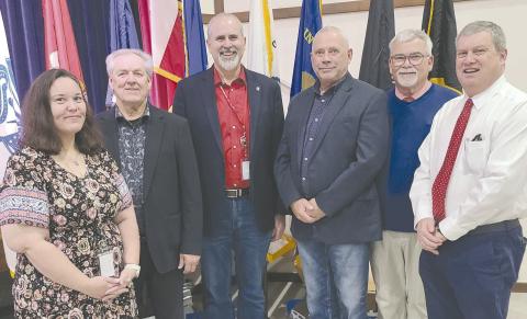 Perryton High School’s annual Veterans Day program brought together students of all ages to honor local veterans. In addition to presentations recognizing every veteran attendee, there were also musical and poetry performances. Pictured are, from left, PHS principal Tori Little, master of ceremonies Marlon Sparks, PISD superintendent Greg Brown, prayer leader Duce Cooper, and Keith Harris and Bill Bob Thrash, who both led recognition of veterans.