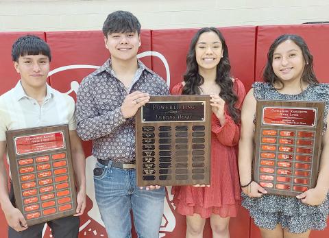 PHS POWERLIFTERS WIN HEFTY HONORS— 